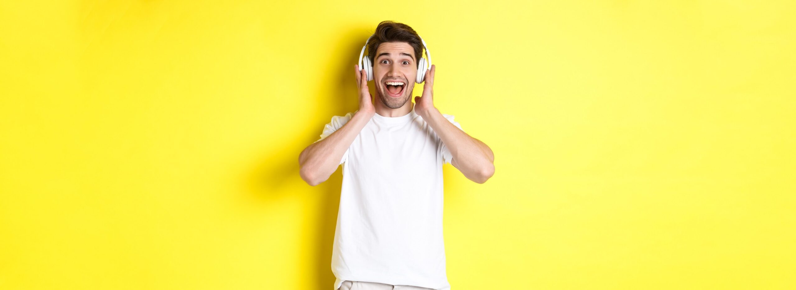 man-in-headphones-looking-surprised-and-happy-lis-2023-01-18-07-22-08.jpg